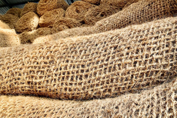 Coir fibre geotextile used for erosion control and soil stabilization in a construction project, showcasing its natural and durable material